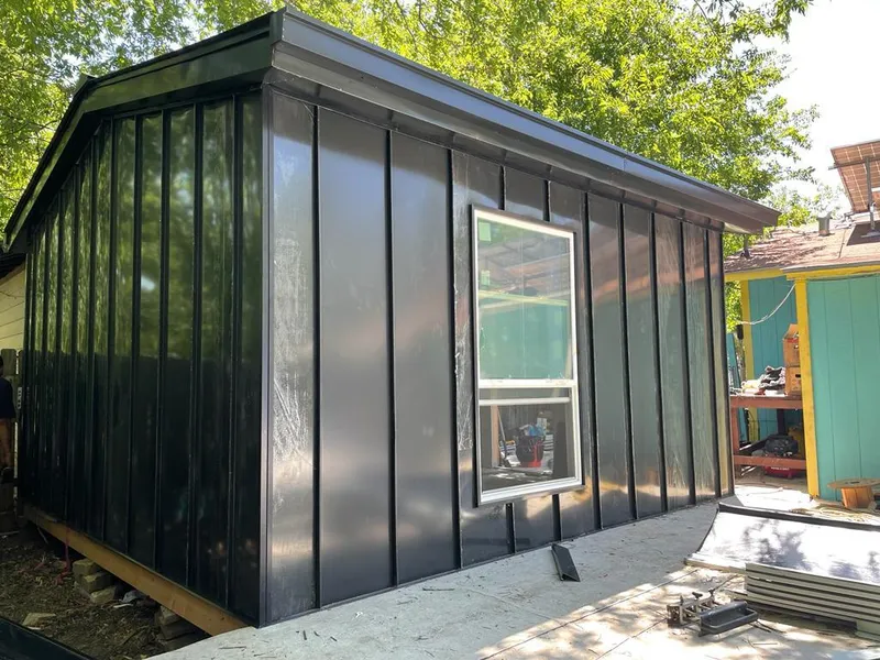 Black standing seam metal wall panels for Metal Roof Installation in New Castle