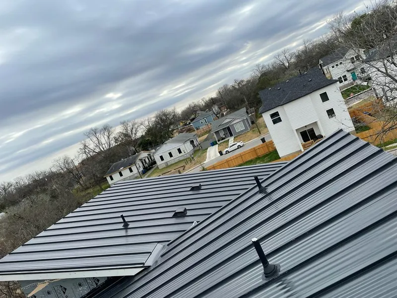 Standing seam metal roof panels with vents for Skylight Repair in New Castle